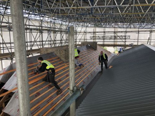 Click Here To Enlarge This Photo Of Strip & Re-Sheet - Kingspan Roofing System