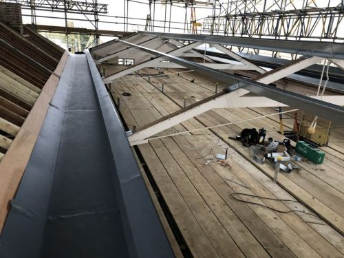 Click Here To Enlarge This Photo Of Strip & Re-Sheet - Kingspan Roofing System