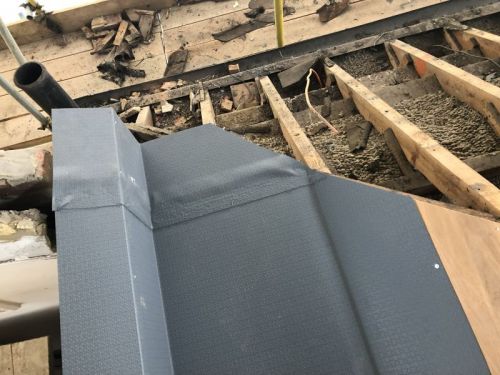 Click Here To Enlarge This Photo Of Strip & Re-Sheet - Kingspan Roofing System