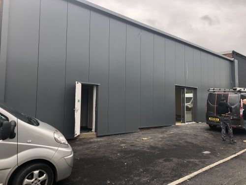 Click Here To Enlarge This Photo Of Overclad existing masonry with Kingspan KS1000MR 45mm core Microrib Composite Cladding System