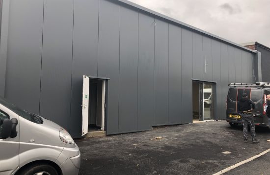 Overclad existing masonry with Kingspan KS1000MR 45mm core Microrib Composite Cladding System