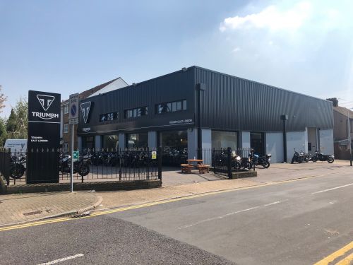 Click Here To Enlarge This Photo Of REFURBISHMENT Overclad existing Masonry Walls with 0.7mm Thick Pre Coated Black Prisma, Ral 9005 Galvanised Steel Profile Vertical Cladding