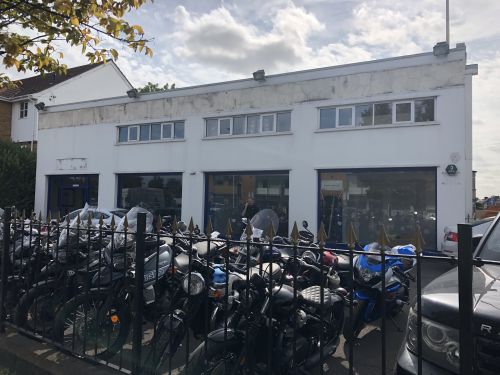 Click Here To Enlarge This Photo Of REFURBISHMENT Overclad existing Masonry Walls with 0.7mm Thick Pre Coated Black Prisma, Ral 9005 Galvanised Steel Profile Vertical Cladding