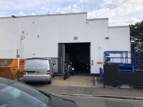 Click Here To Enlarge This Photo Of REFURBISHMENT Overclad existing Masonry Walls with 0.7mm Thick Pre Coated Black Prisma, Ral 9005 Galvanised Steel Profile Vertical Cladding
