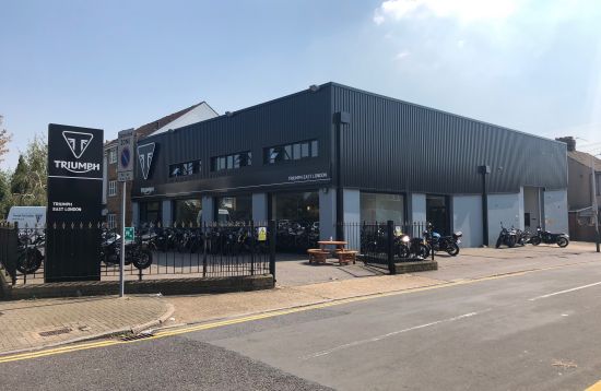 REFURBISHMENT Overclad existing Masonry Walls with 0.7mm Thick Pre Coated Black Prisma, Ral 9005 Galvanised Steel Profile Vertical Cladding