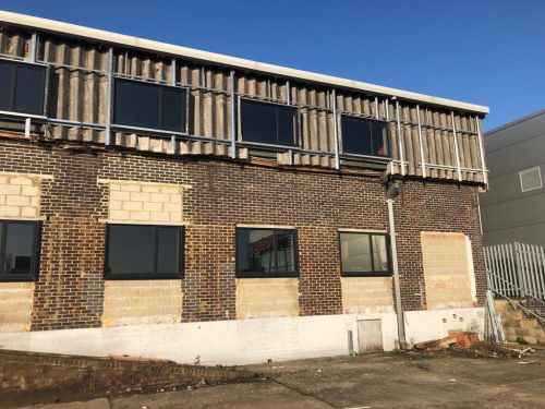 Click Here To Enlarge This Photo Of REFURBISHMENT Overclad existing front elevation with Kingspan KS1000
