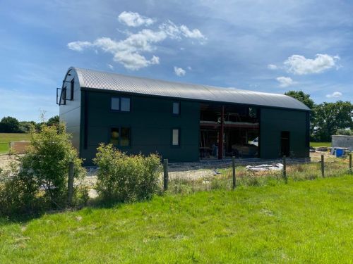 Click Here To Enlarge This Photo Of Dutch Barn Conversion - Curved Roofing System & Kingspan KS1000 MR Micro Rib Horizontal Wall Cladding