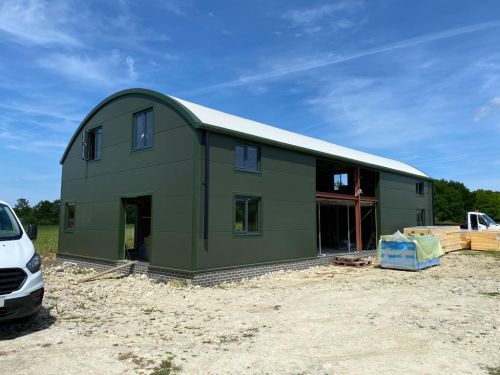 Click Here To Enlarge This Photo Of Dutch Barn Conversion - Curved Roofing System & Kingspan KS1000 MR Micro Rib Horizontal Wall Cladding