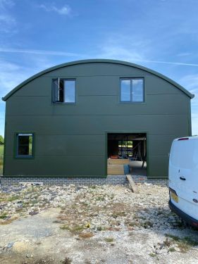 Click Here To Enlarge This Photo Of Dutch Barn Conversion - Curved Roofing System & Kingspan KS1000 MR Micro Rib Horizontal Wall Cladding