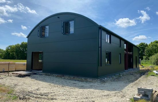 Dutch Barn Conversion - Curved Roofing System & Kingspan KS1000 MR Micro Rib Horizontal Wall Cladding