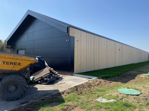 Click Here To Enlarge This Photo Of Betteshanger Country Park - Untreated Siberian Larch Kiln Dried Vertical Cladding & Kingspan KS1000 MicroRib AWP Horizontal Wall Cladding