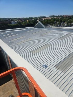 Click Here To Enlarge This Photo Of Roof Refurbishment - Brett Martin Mansafe Non Fragile GRP, Giromax Roof Coat & Euroclad Reverse Profile Cladding