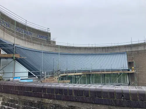 Click Here To Enlarge This Photo Of Euroclad Elite 4 Range aluminium tapered Standing Seam built up Roofing System in Slate Grey to 2 no. roofs for a valued client in Dover, Kent.